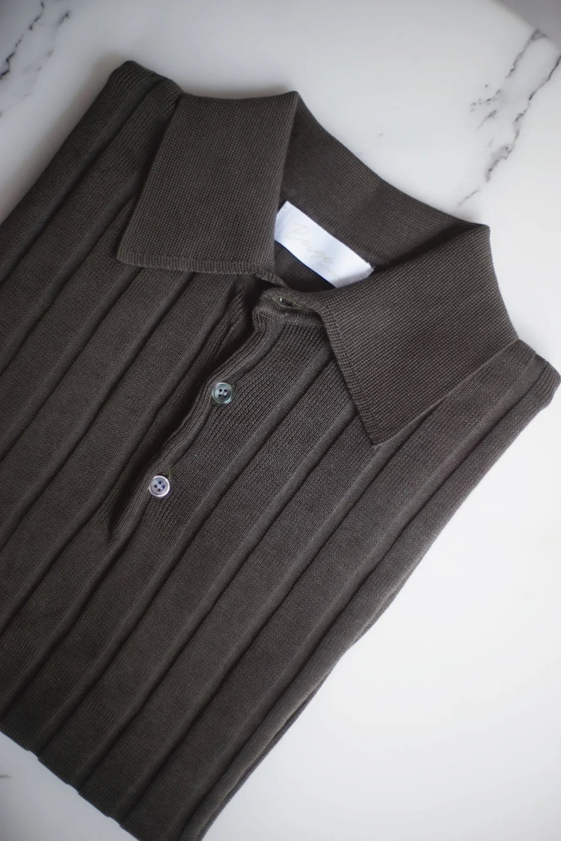 STRIPED KNITTED POLO SHIRT
