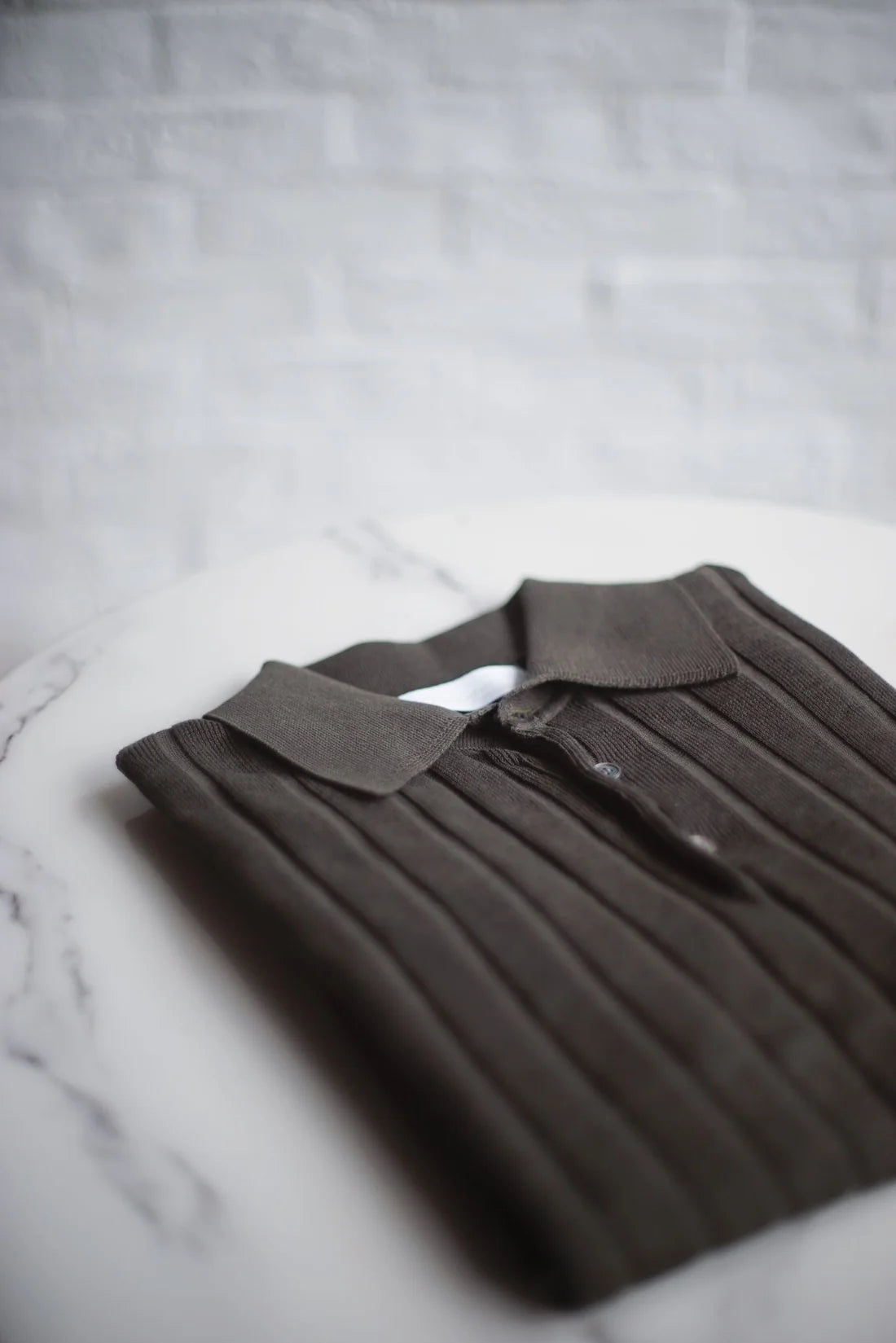STRIPED KNITTED POLO SHIRT
